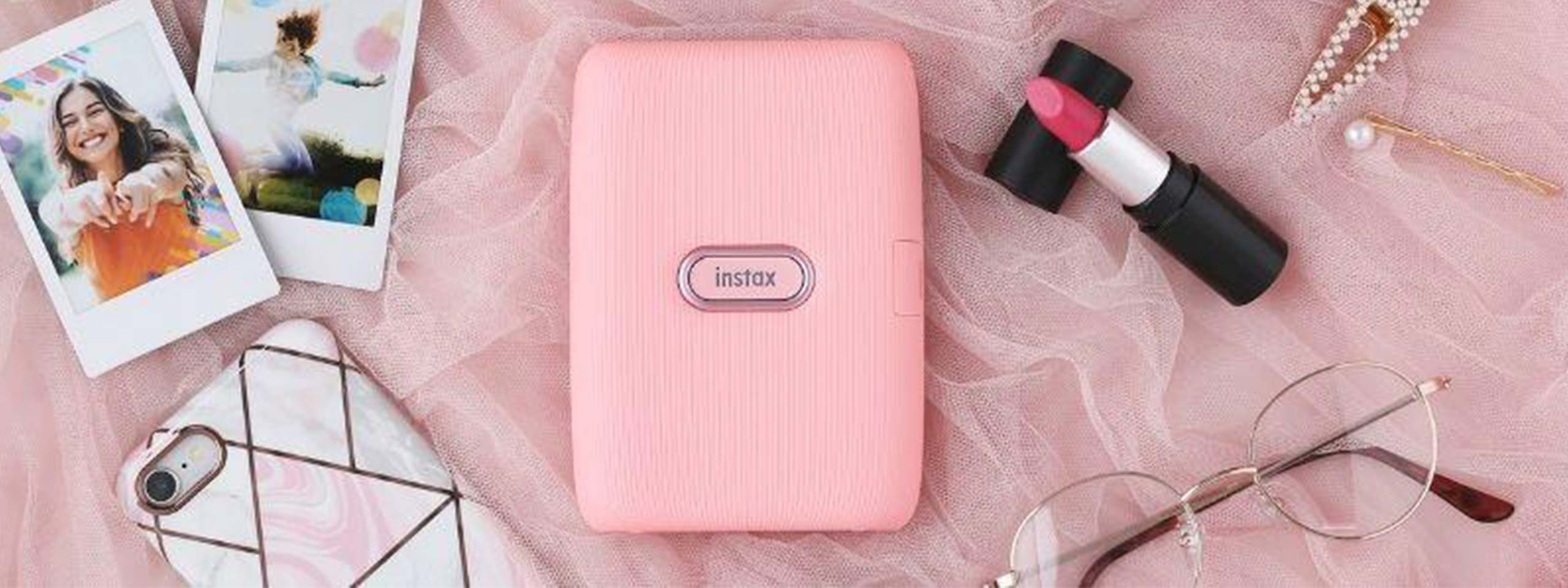Den smarte trådløse mini Link-skriveren i rosa - perfekt for å ta instant bilder